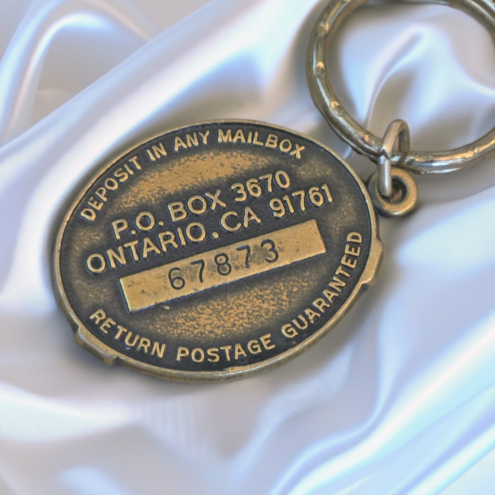 Vintage First Trust Bank Ontario California 1887 Centennial Keychain Advertising