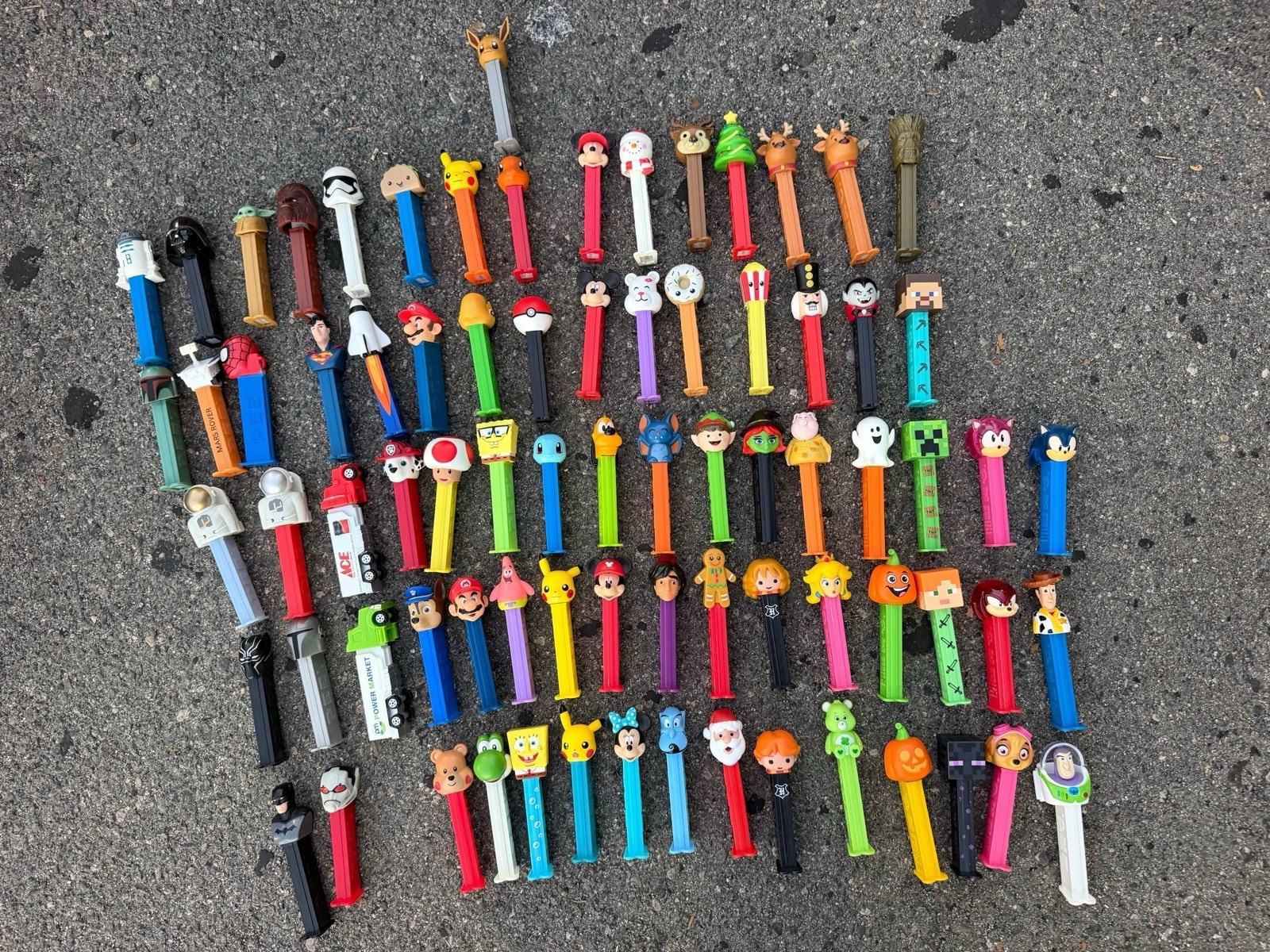 Lot of 78 Assorted PEZ Candy Dispensers Disney Star Wars Nintendo Pokemon