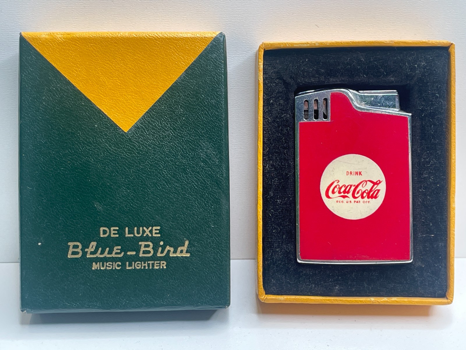 Rare De luxe Blue-Bird Music Lighter Coca-Cola Hadson Patent No. 13719 Unfired 