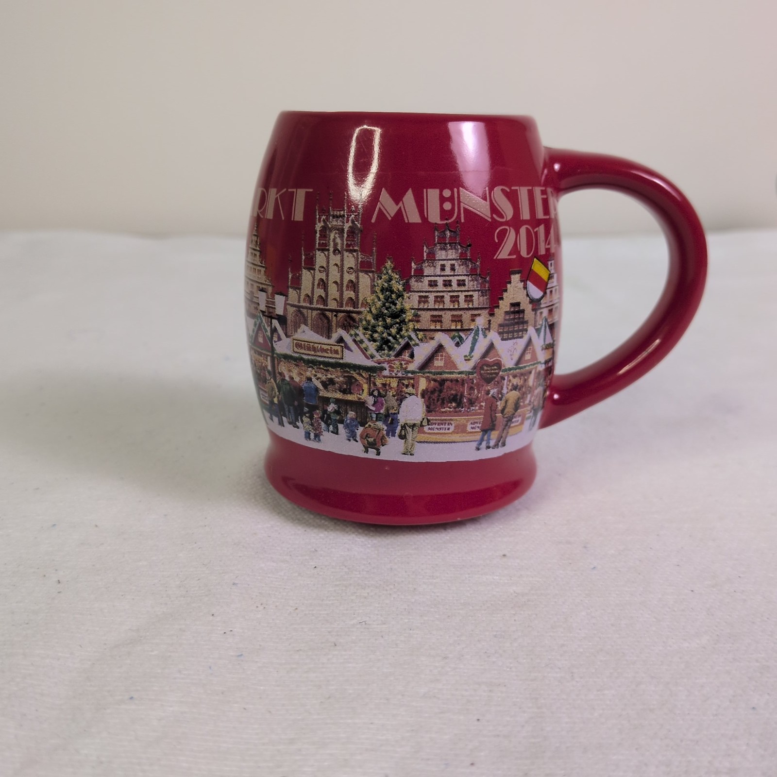 red ceramic souvenir mug from the 2014 Christmas market in Münster, Germany...