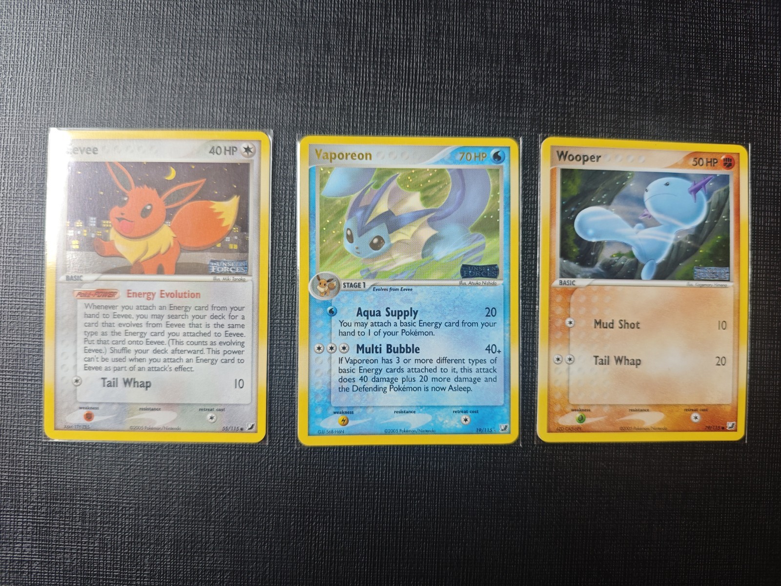 Nintendo Pokemon Unseen Forces 2005 Lot Holo Eevee 55/115 Vaporeon 19/115 wooper