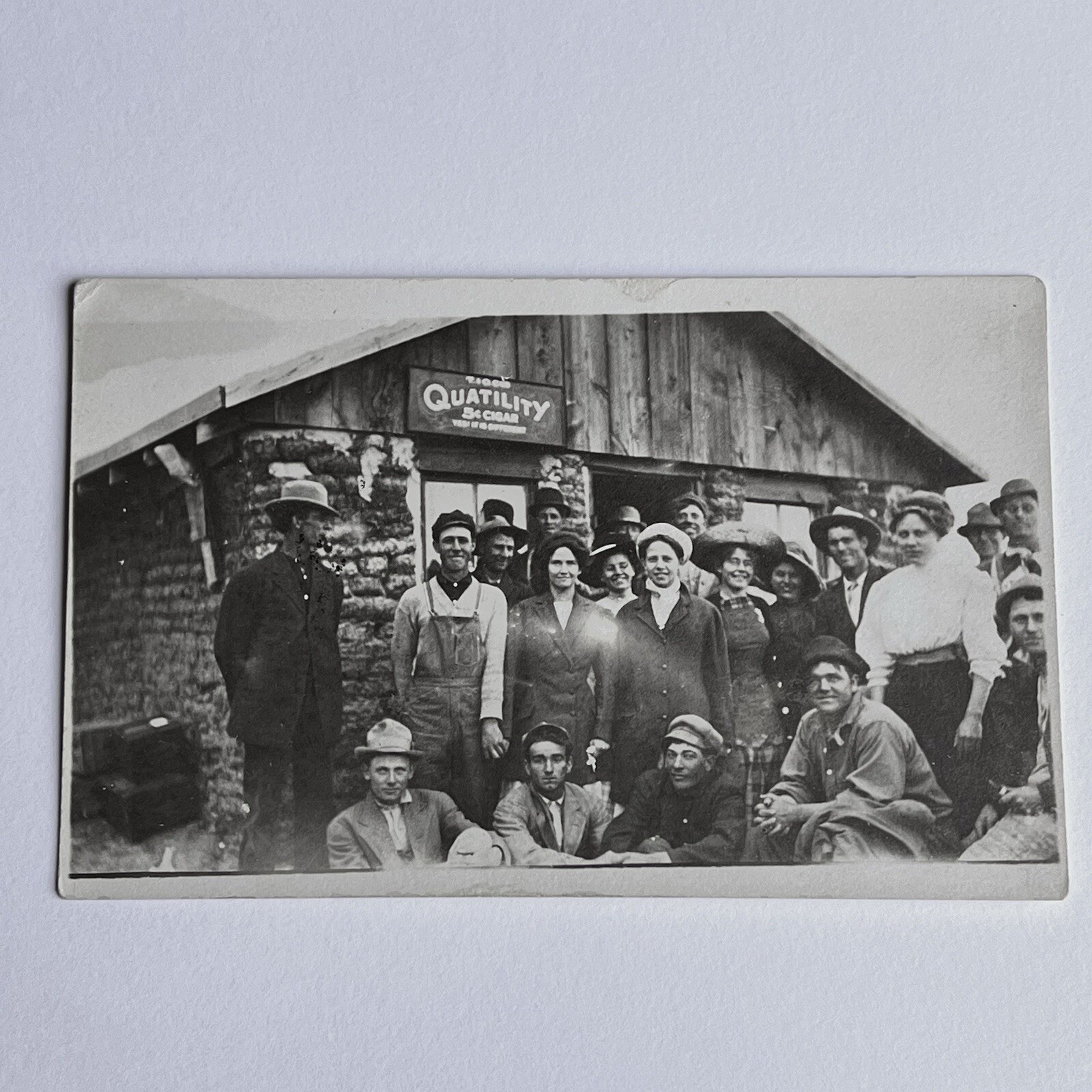 Antique RPPC Real Postcard Group Photograph Men Women Cigar 5 Cent Sign Smiling