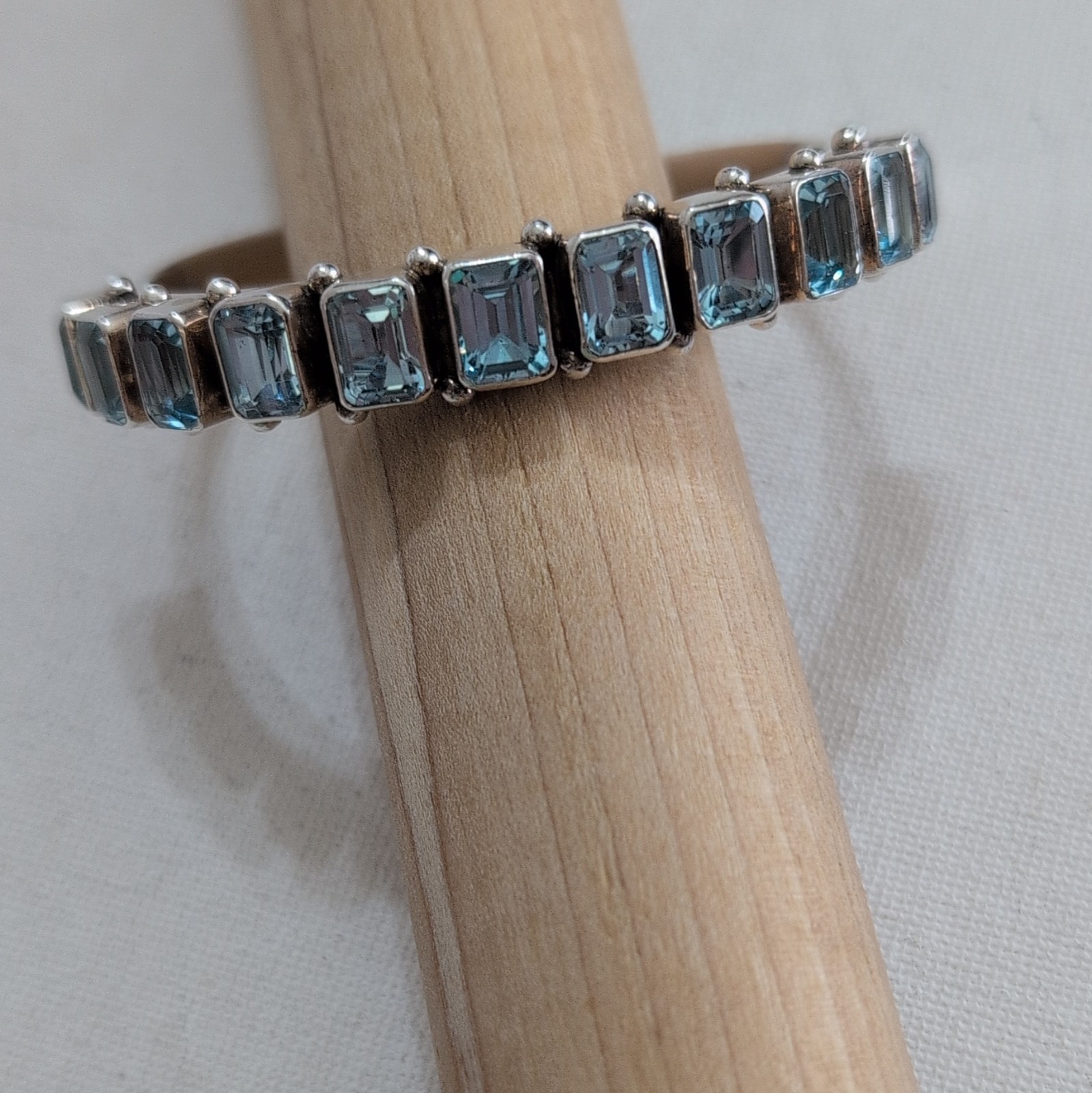 Navajo blue topaz cuff by Leroy Secatero . Sterling silver & signed.