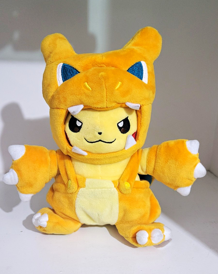 Pokémon Center Pikachu Plush Stuffed Animal in Charizard Orange Costume