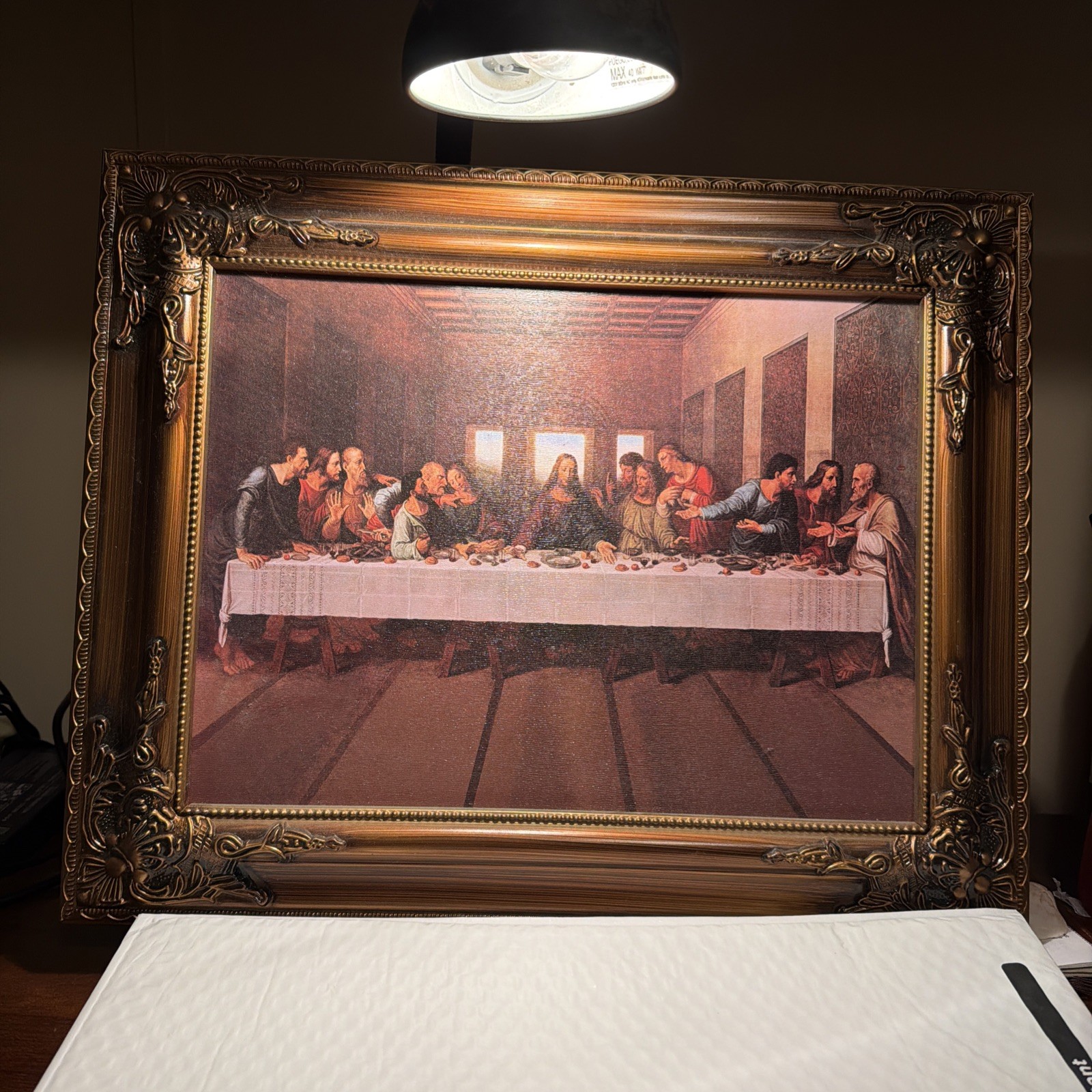 A picture of the Last  Supper framed art decor. 