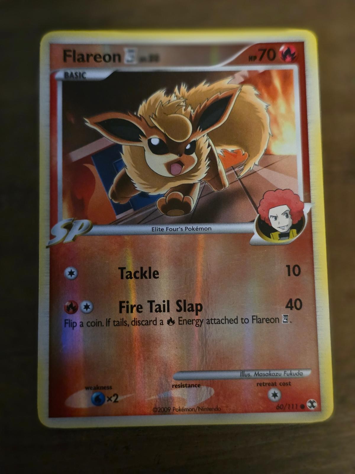 Flareon E4 60/111 Rising Rivals Pokemon Reverse Holo Moderately Played