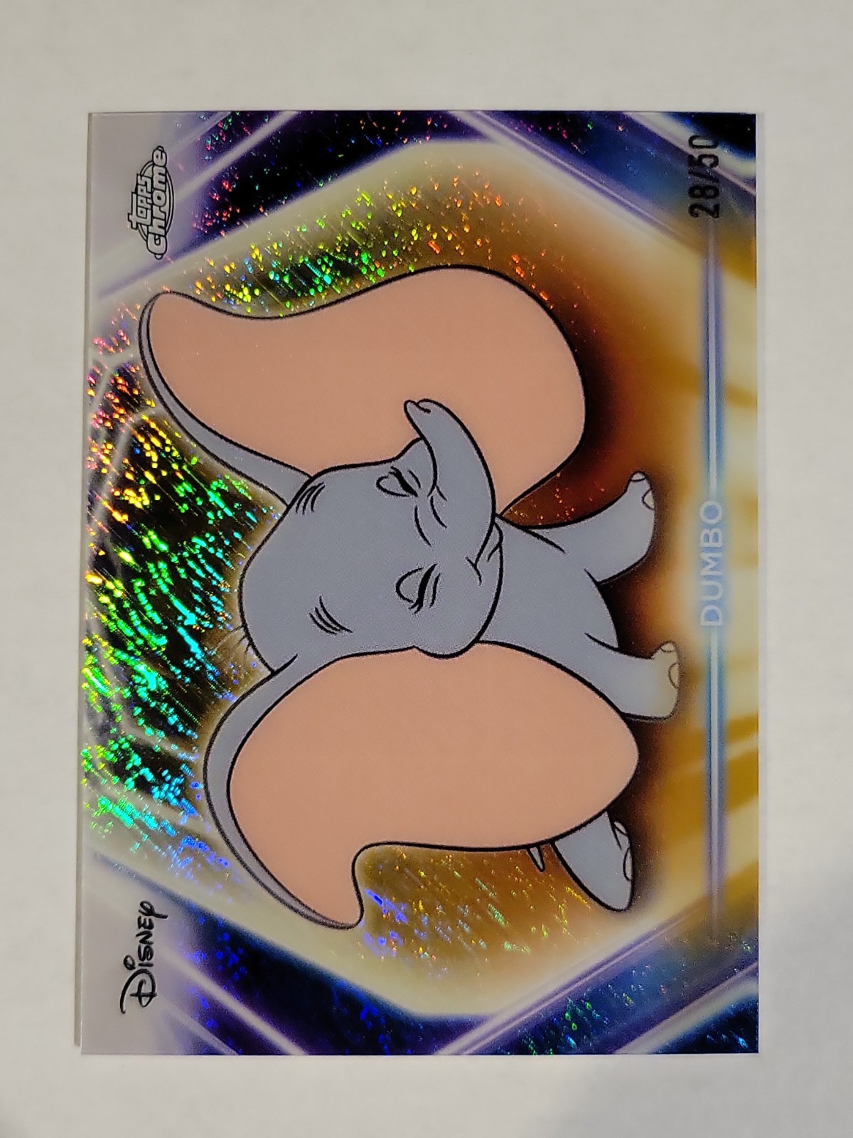 2026 Topps Disney Neon Chrome Neon Etch Gold Shimmer #CNE-185 Dumbo 28/50