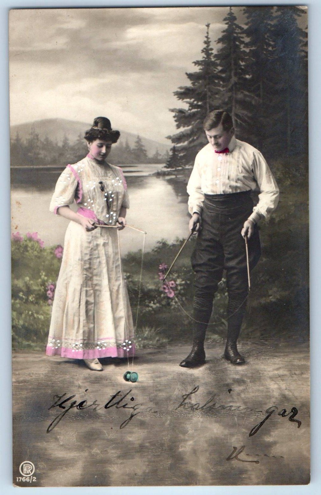 c1910's Couple Pretty Woman Playing Diabolo RPPC Photo Posted Antique Postcard