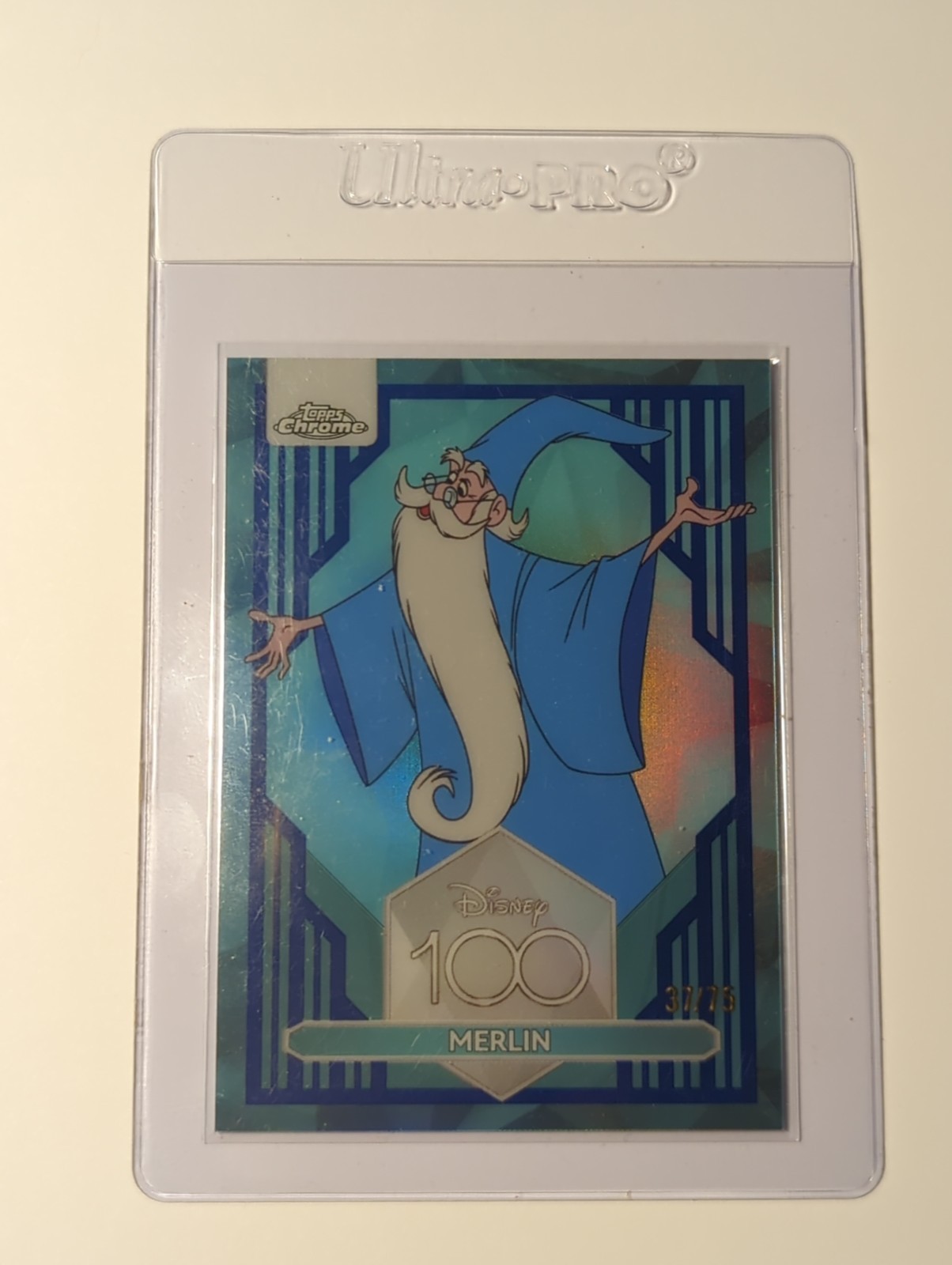 2023 Topps Chrome Disney 100 MERLIN Dark Light Blue Refractor /75