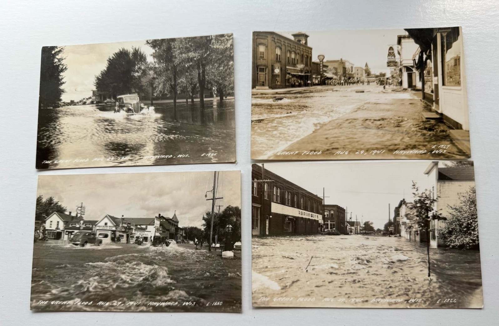 4 VTG RPPC Flood Hayward WI Postcard Cafe Gas Power Record Grocery Store Main St