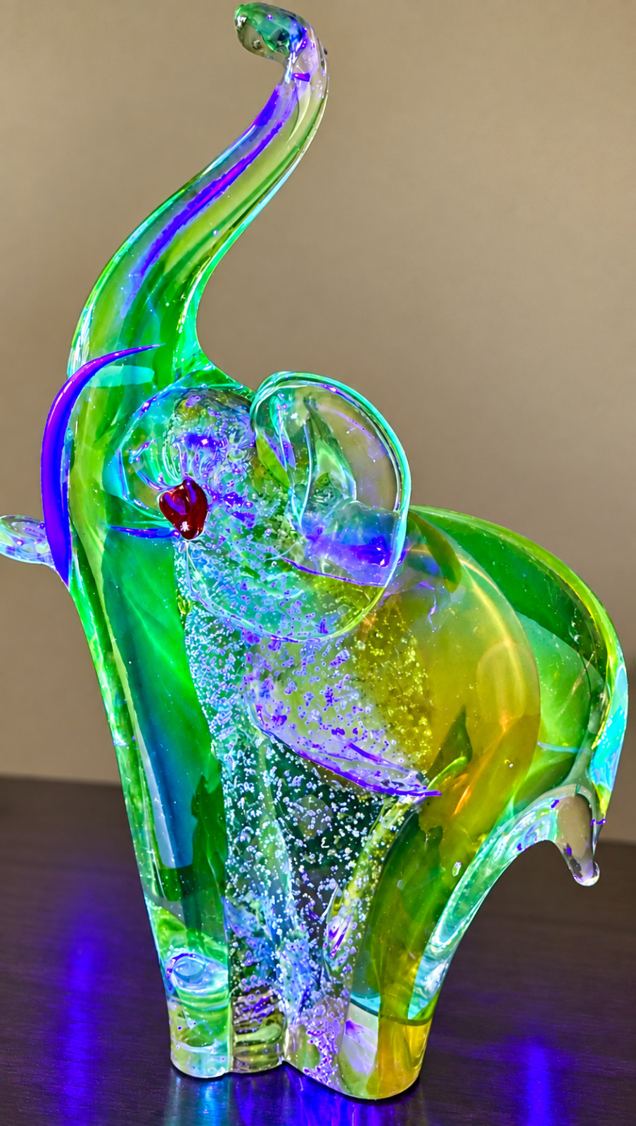 Murano ( likely ) glass elephant, CoLORFUL , reactive to UV light