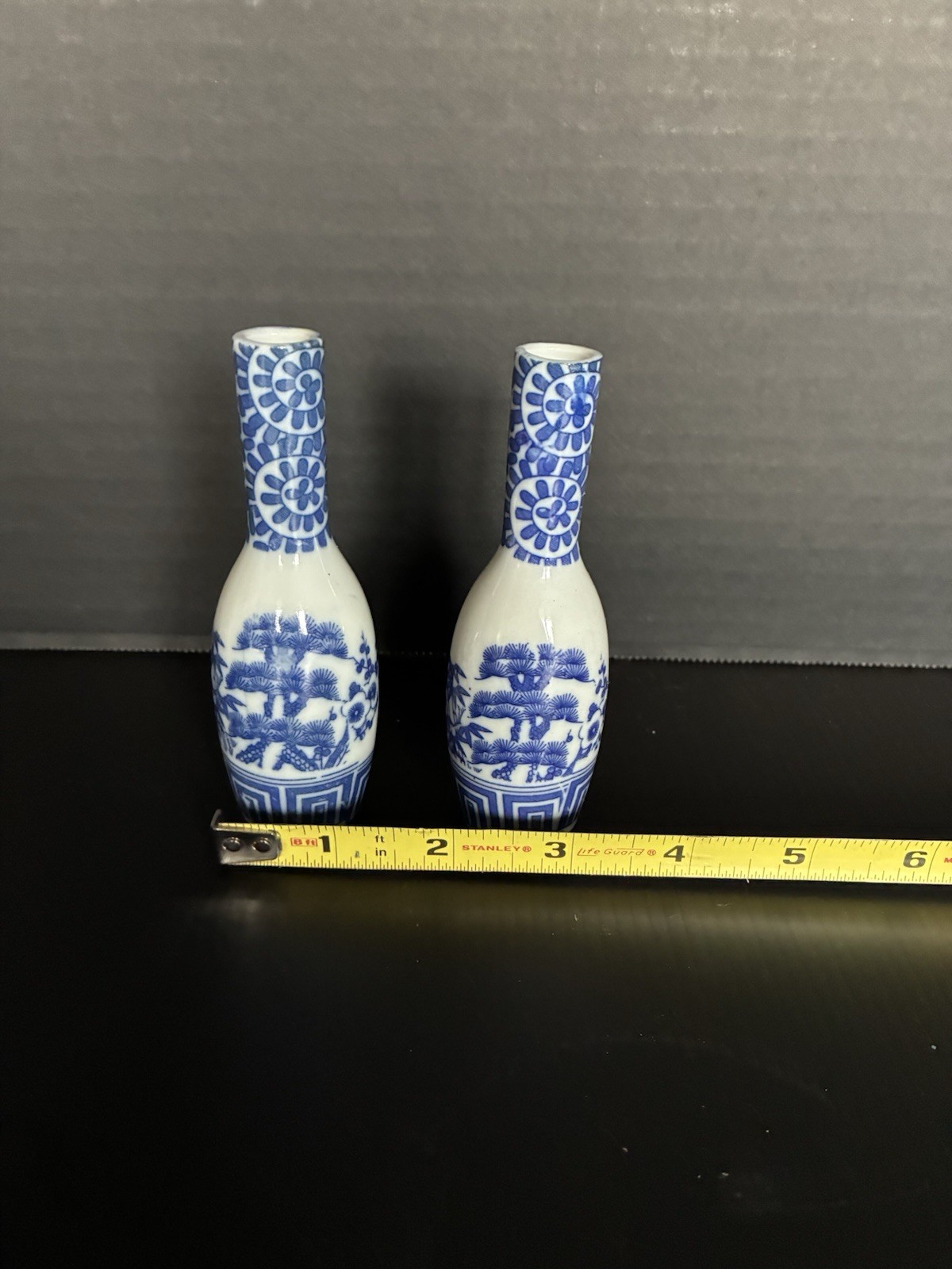 Japanese blue and white porcelain miniature sake bottles.