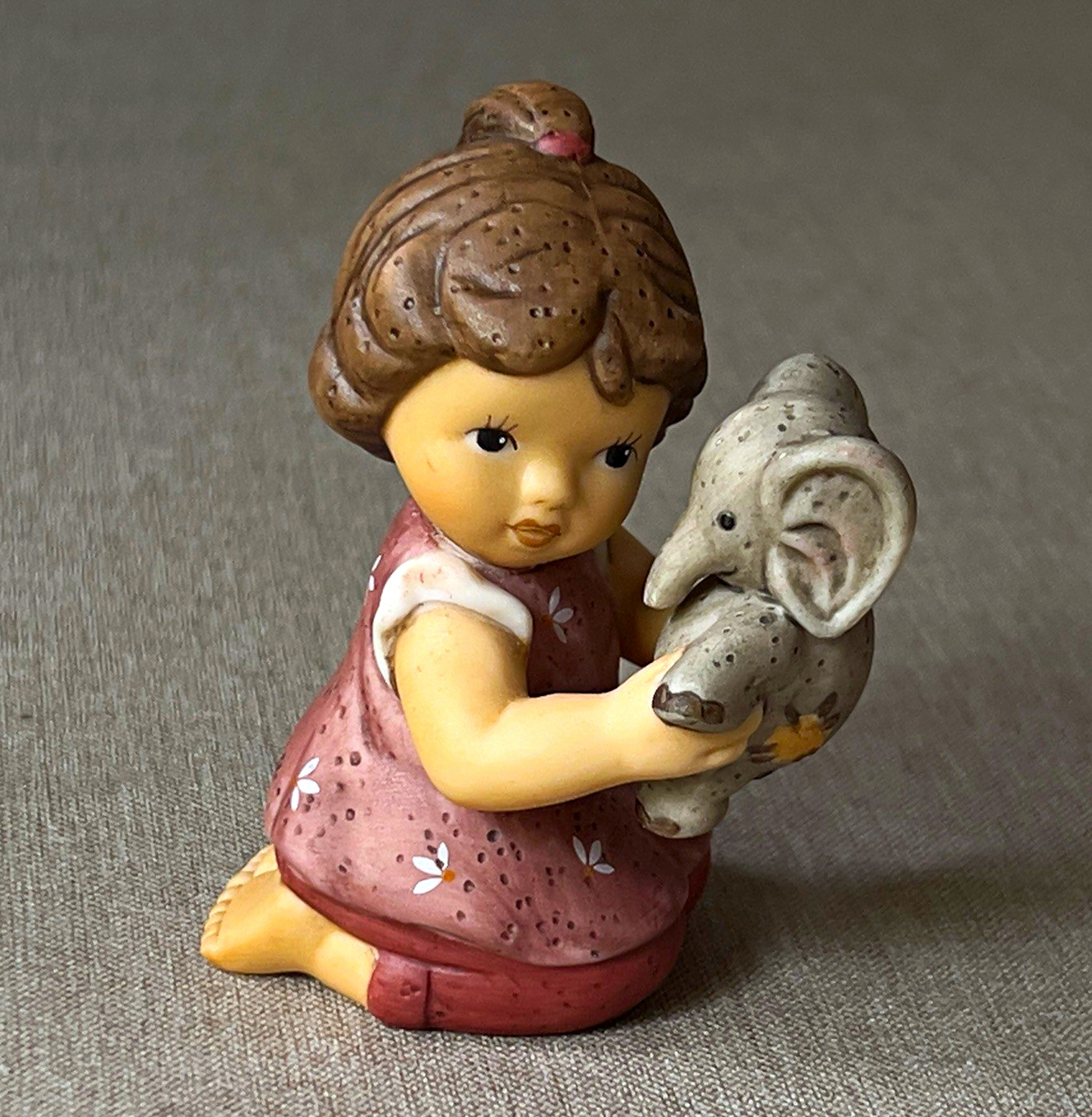 Goebel Nina Marco Porcelain Figurine Multicolor Girl Holding Elephant, 1 Pack