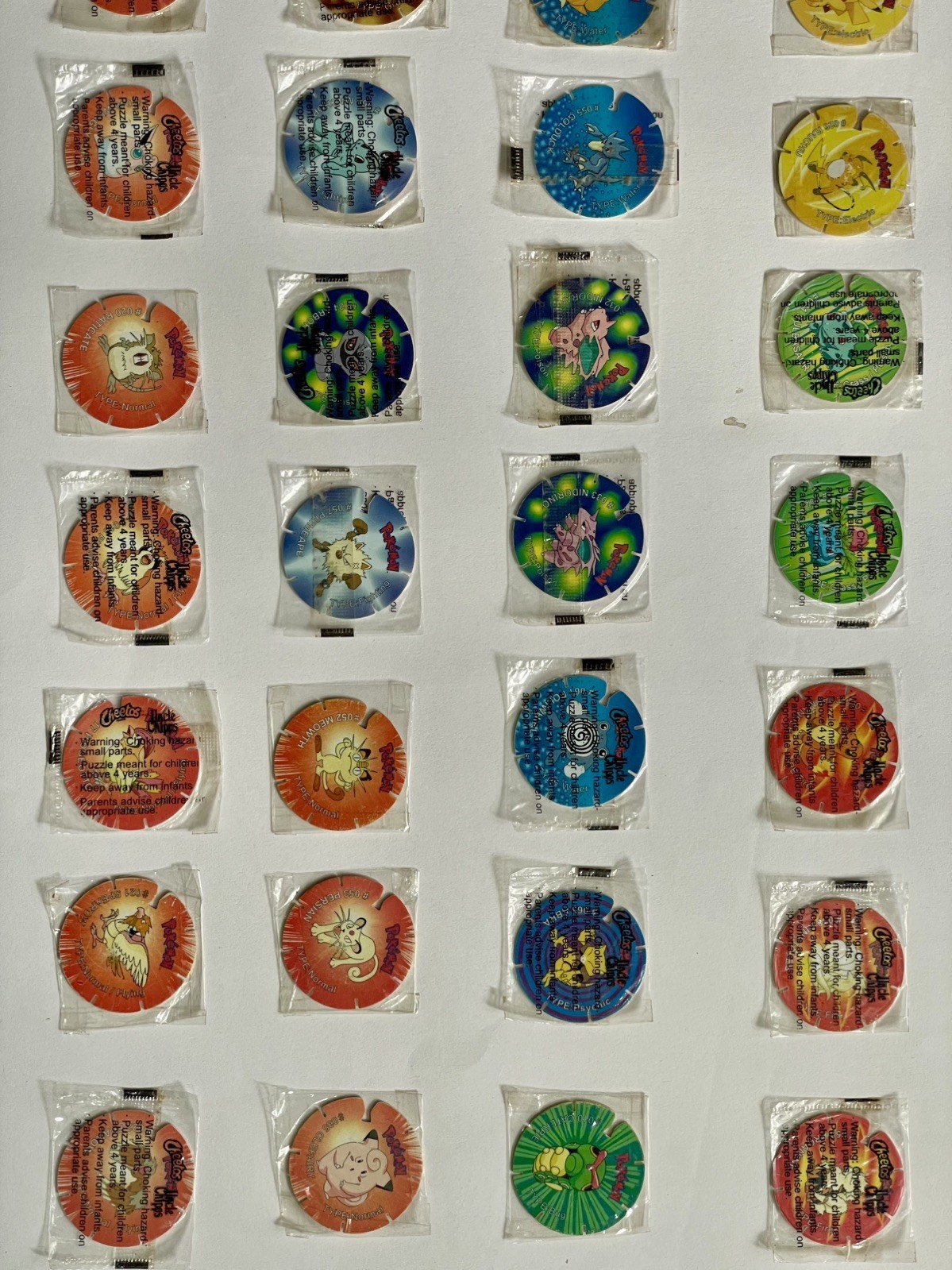 VINTAGE 2003 NINTENDO LICENSED CHEETOS TAZOS POKEMON COLLECTION