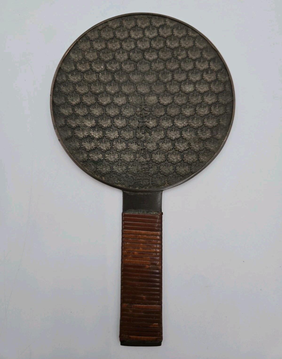 Japanese antique bronze mirror with detailed paulownia pattern, Edo period