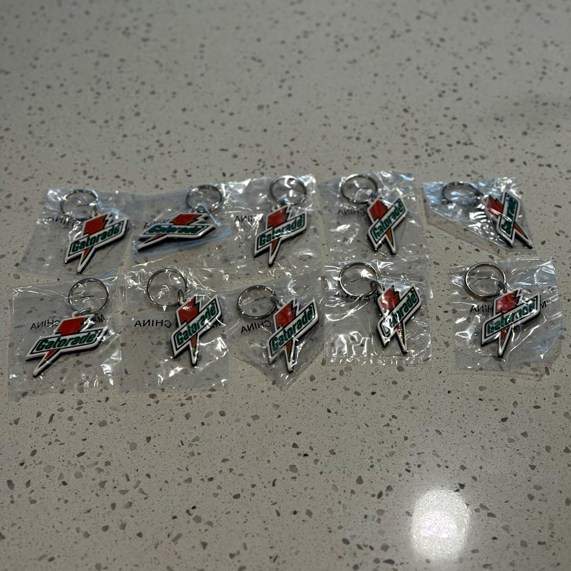 Vintage Gatorade Lightning Bolt Logo Metal Keychains Lot of 10
