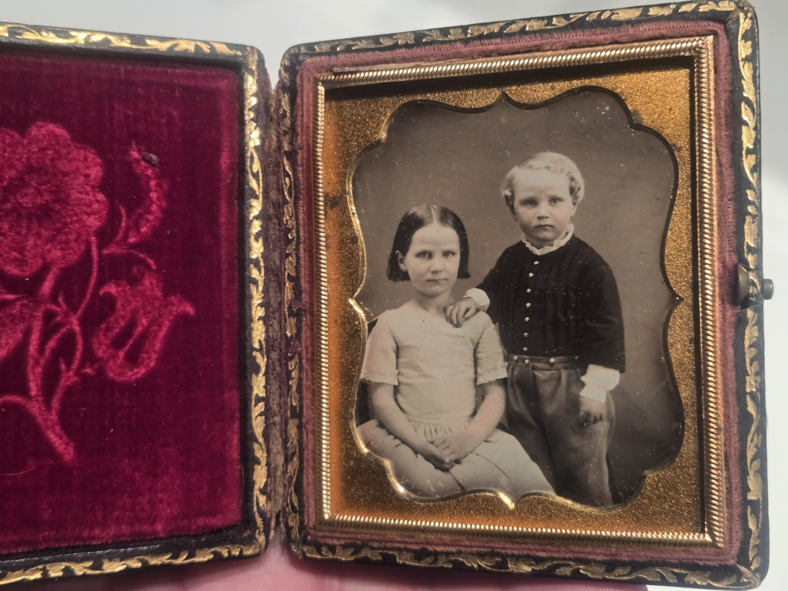 Sixth plate daguerreotype of a brother and sister siblings MOP case bad shape
