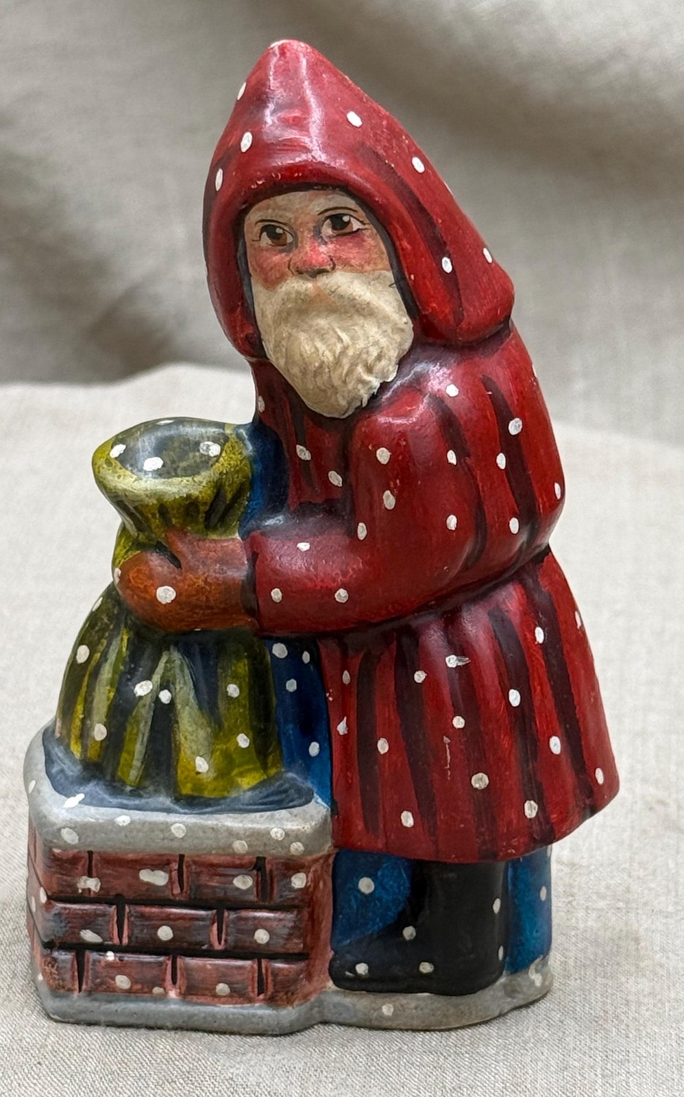 Vaillancourt folk art belsnickle figure: red polka dot chalkware christmas