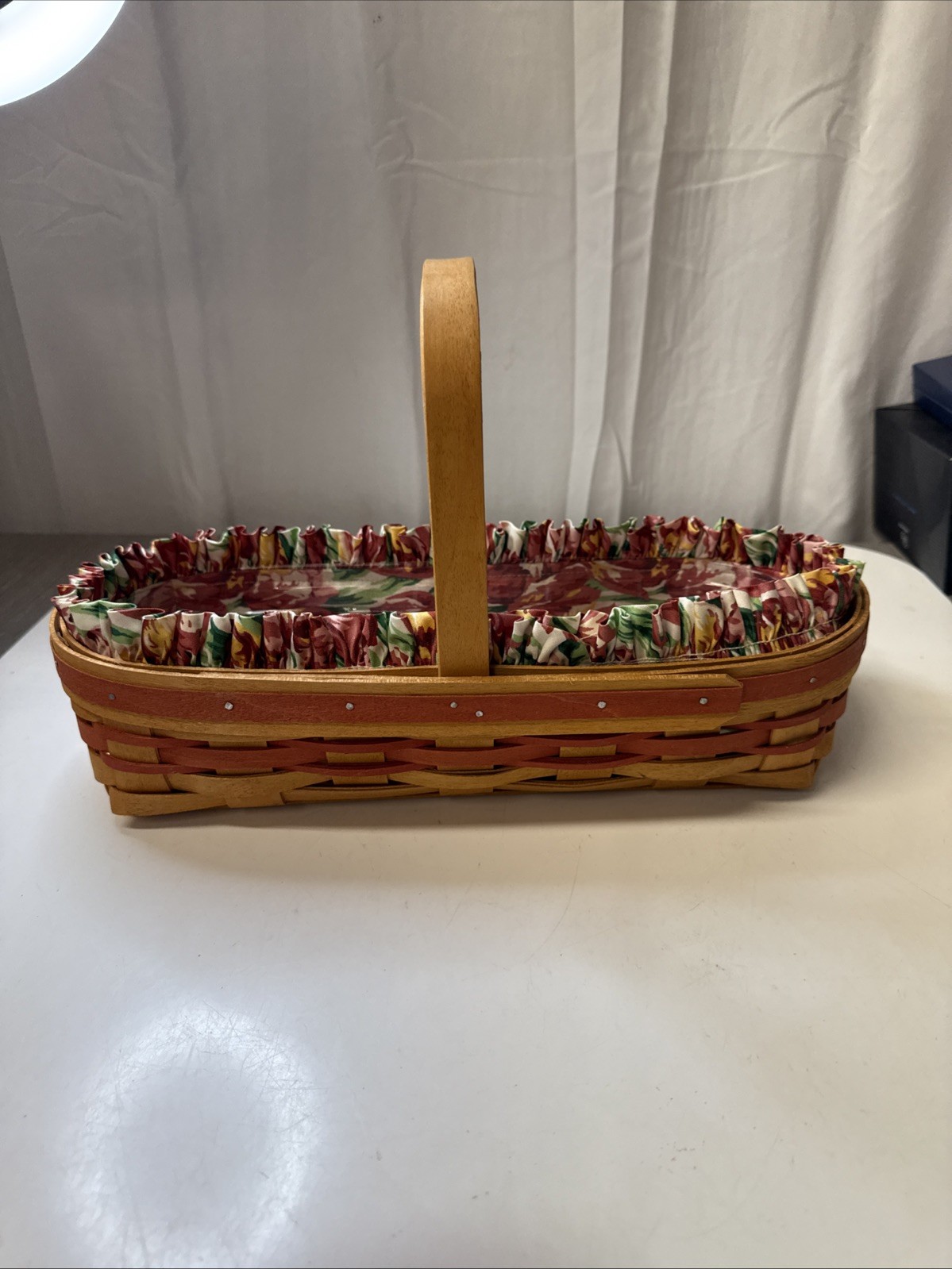 longaberger oval basket with red flower liner and plastic liner 1995