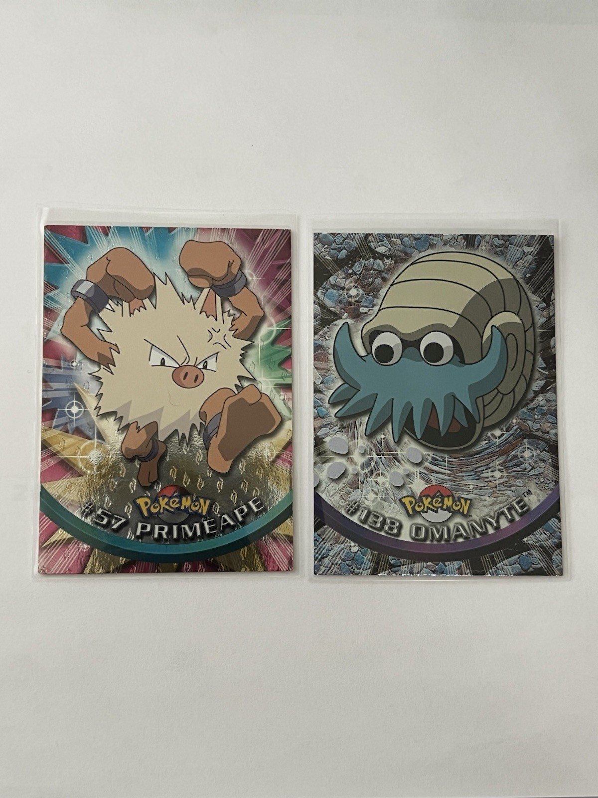 1999 2000 Topps Pokemon Foil Primeape #57 & Omanyte #138 Blue Logo Lot
