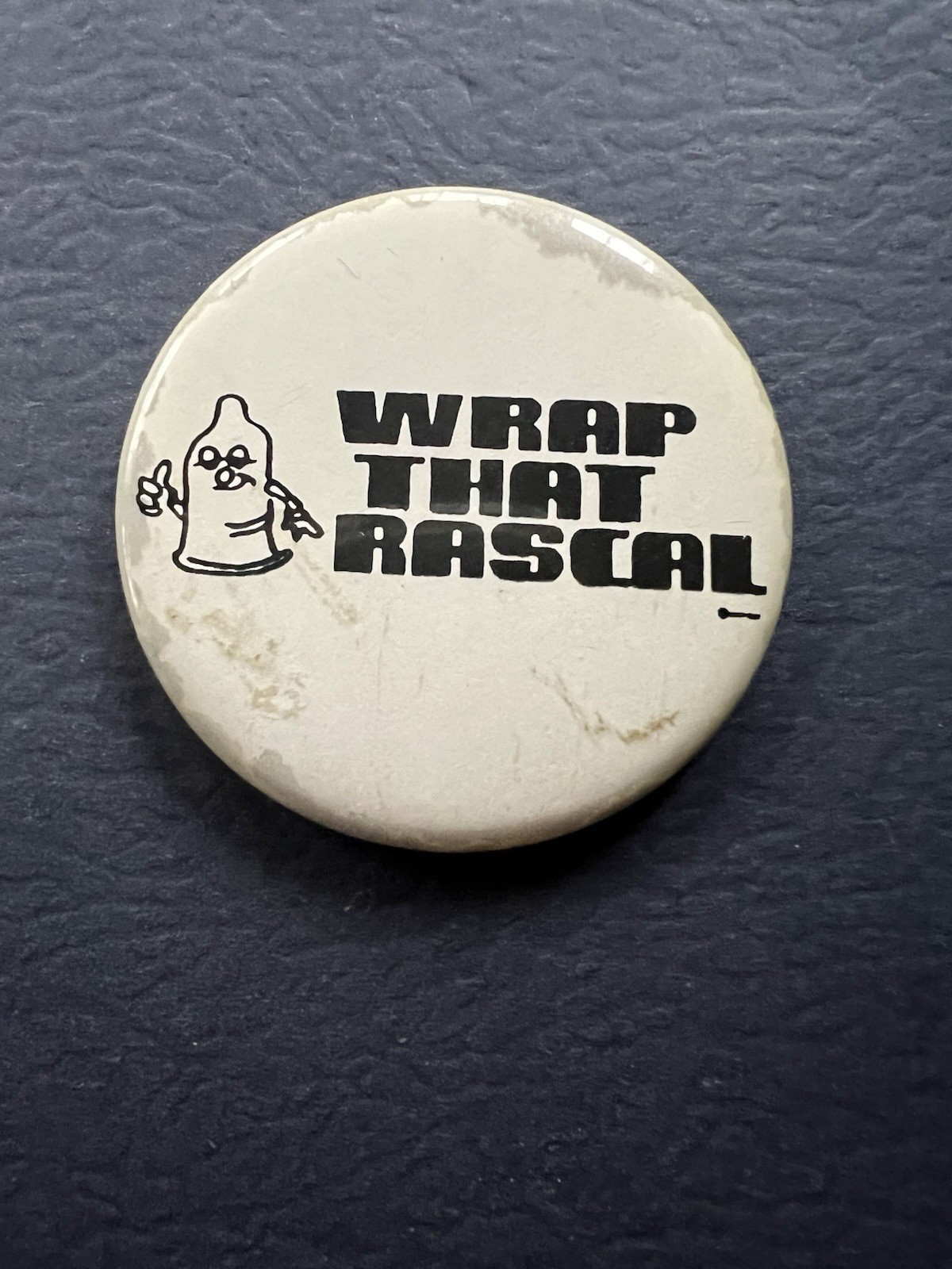 Vintage Wrap That Rascal Pinback Button Novelty Condom Badge