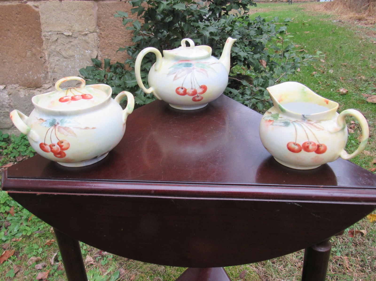 1924 Porcelain signed Teapot, Sugar, and Creamer with H.P. Cherries and Flowers