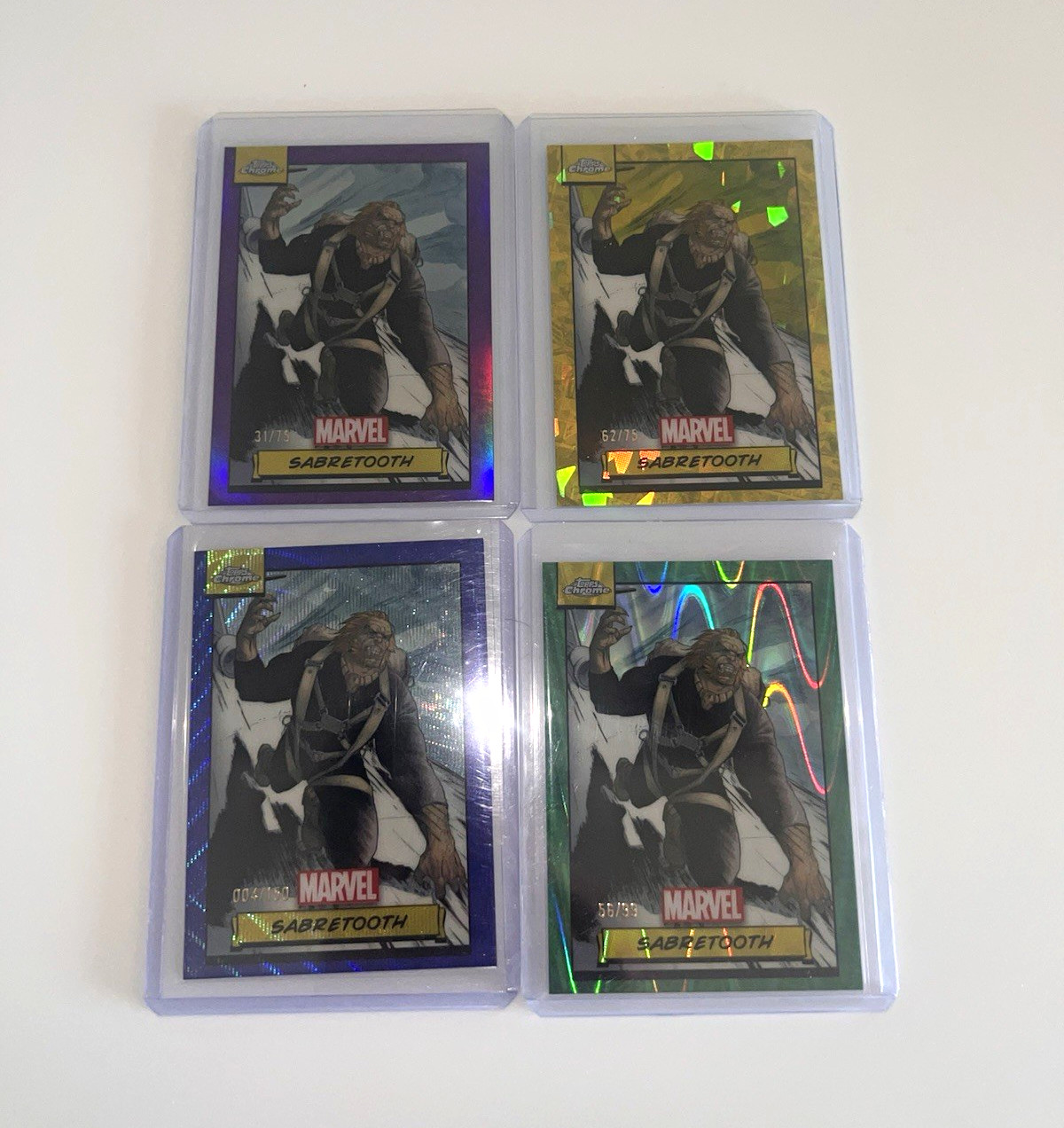 2024 Topps Chrome Marvel Sabretooth 4- Purple n Yellow /75, blue /150 green /99