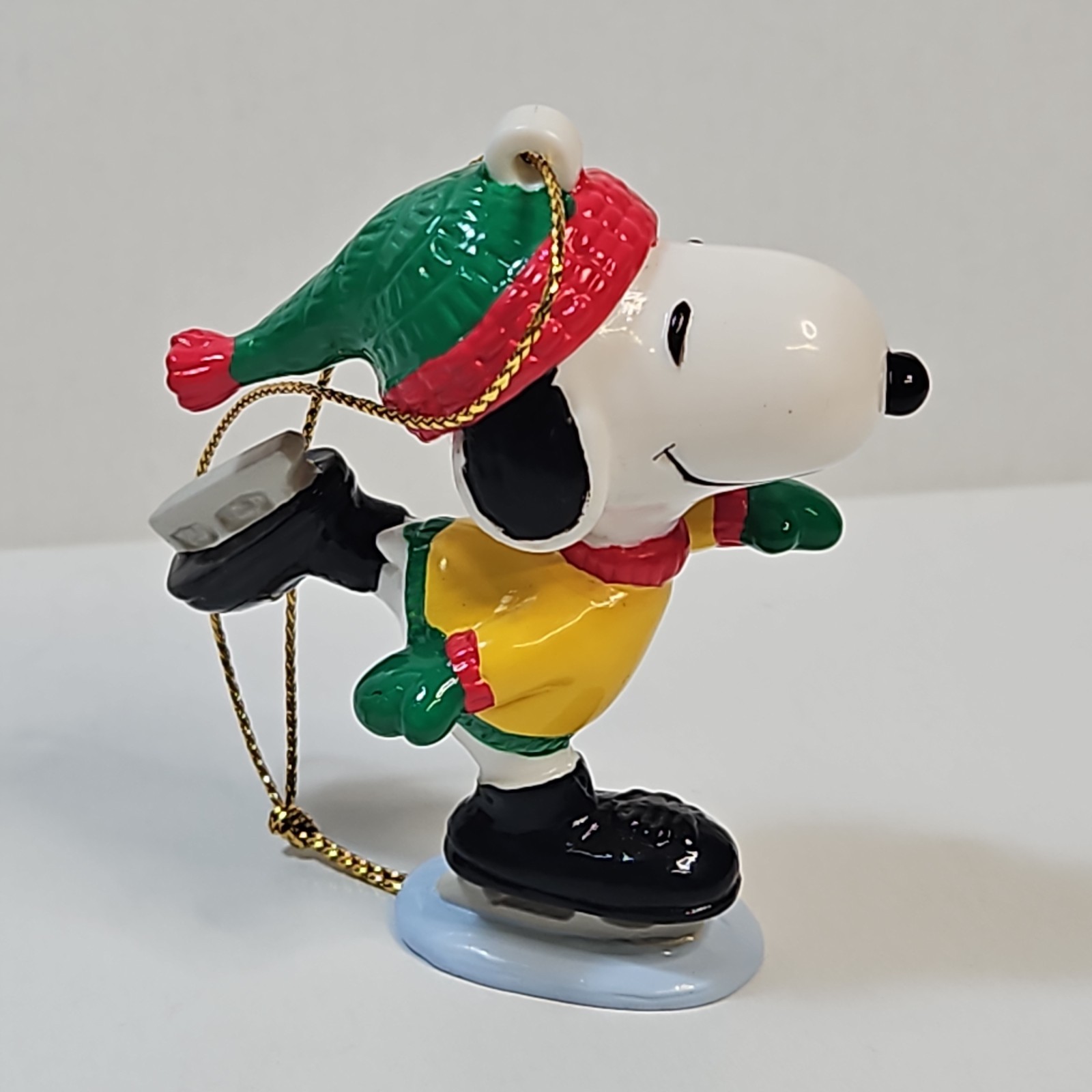Vintage Whitmans PVC Snoopy Figure Ice Skating Christmas Ornament Yellow Sweater