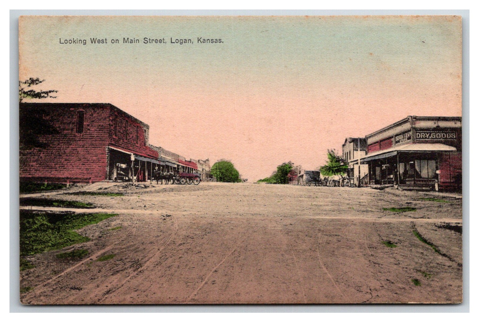 LOGAN KS ~ Early Main street view ~ Dry Goods Store , Shop fronts KANSAS