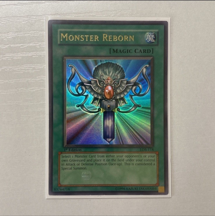 YuGIOh - 1st Edition LOB-118 Monster Reborn - N/A Print - LP Foil Line