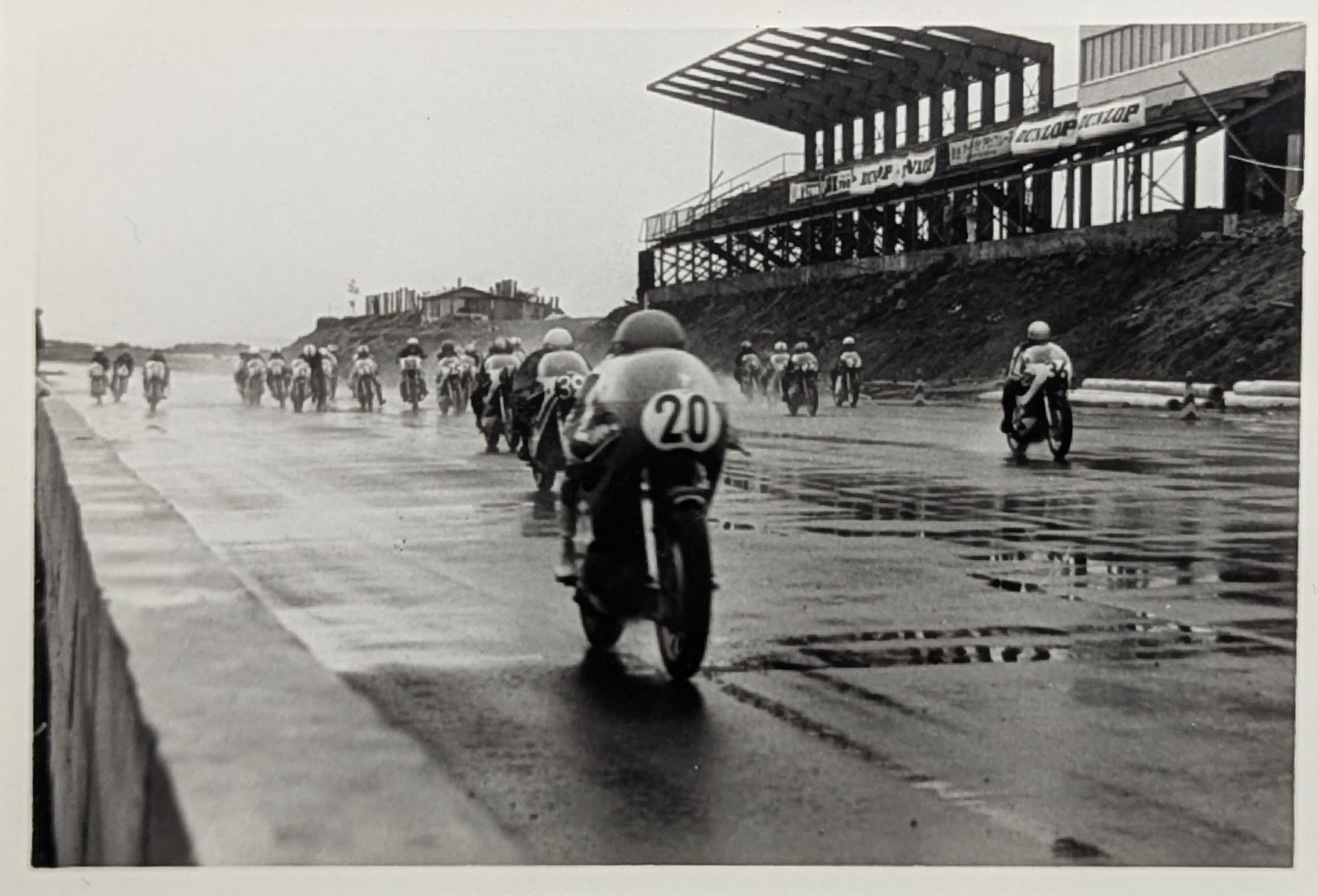 Vtg 1960s Japan Motorcycle Road Race Photo Wet Track Action Dunlop Grandstands