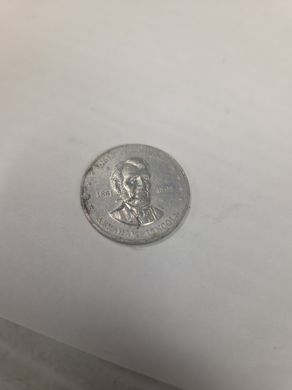 Shell\'s Mr. President Coin Game-Lincoln-Silver-Tone .
