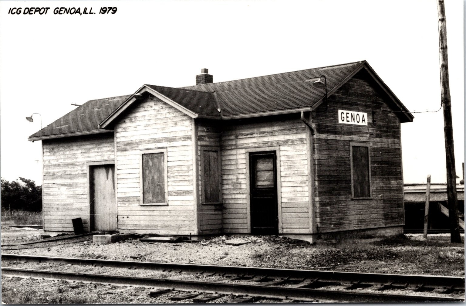 Genoa, IL Illinois ICG Railroad Train Station Depot Postcard RR Tracks
