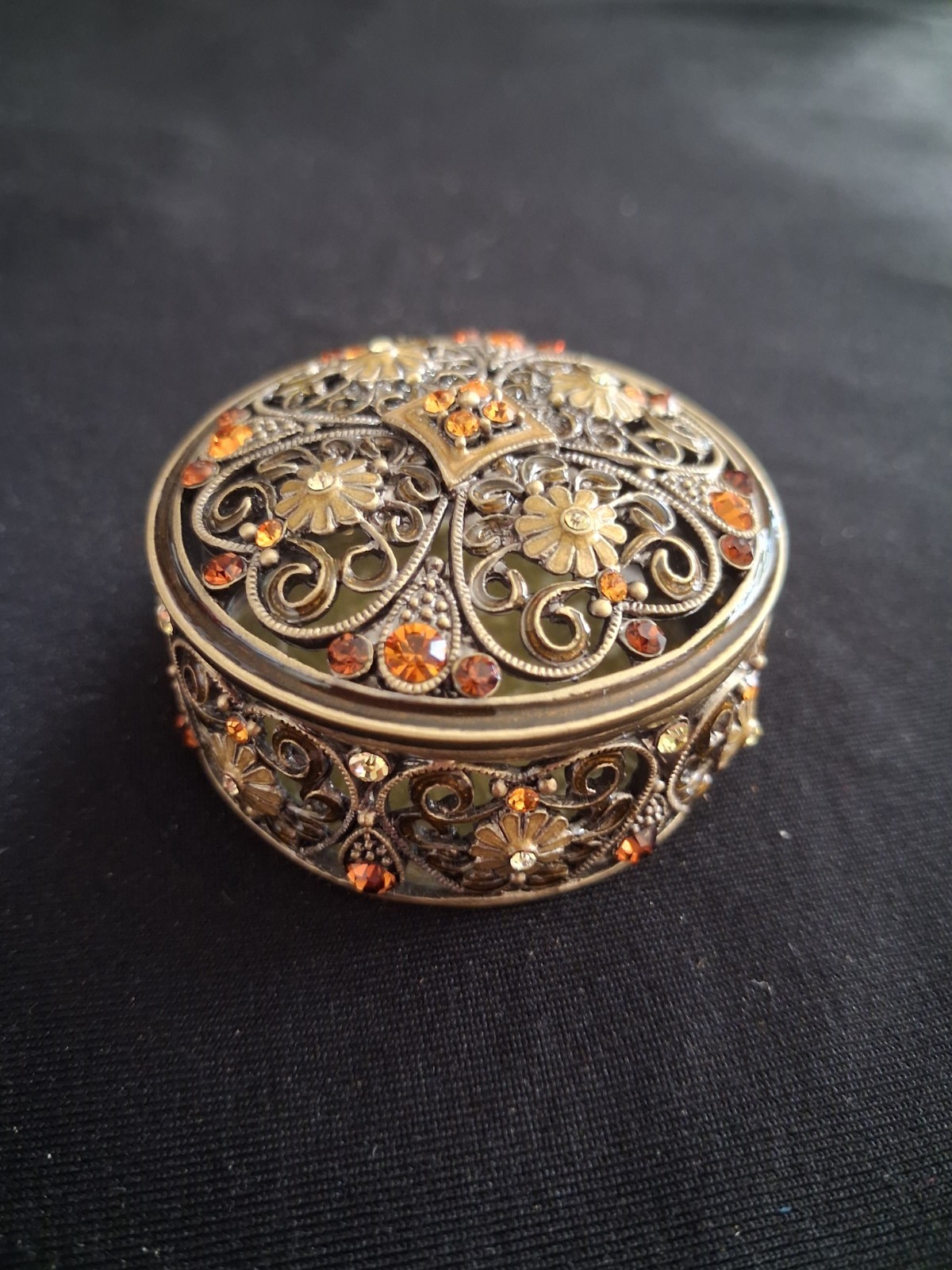 Vintage metal filigree trinket box antique brass tone with amber and crystals