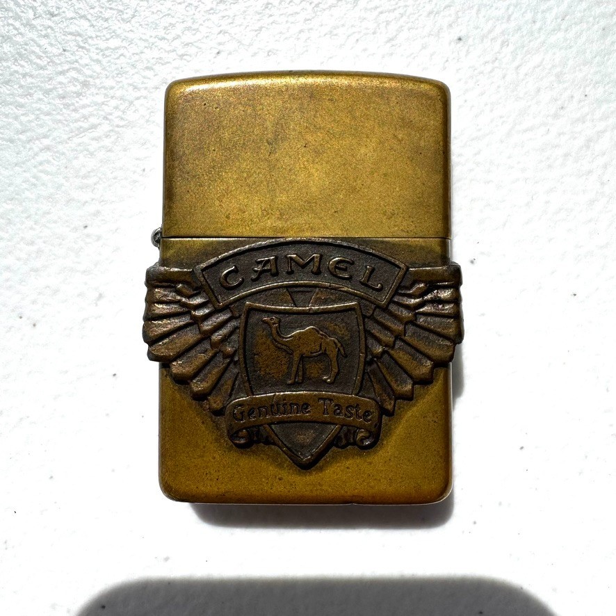 Vintage NOS Camel Genuine Taste Winged Wrap Around Logo Zippo Lighter