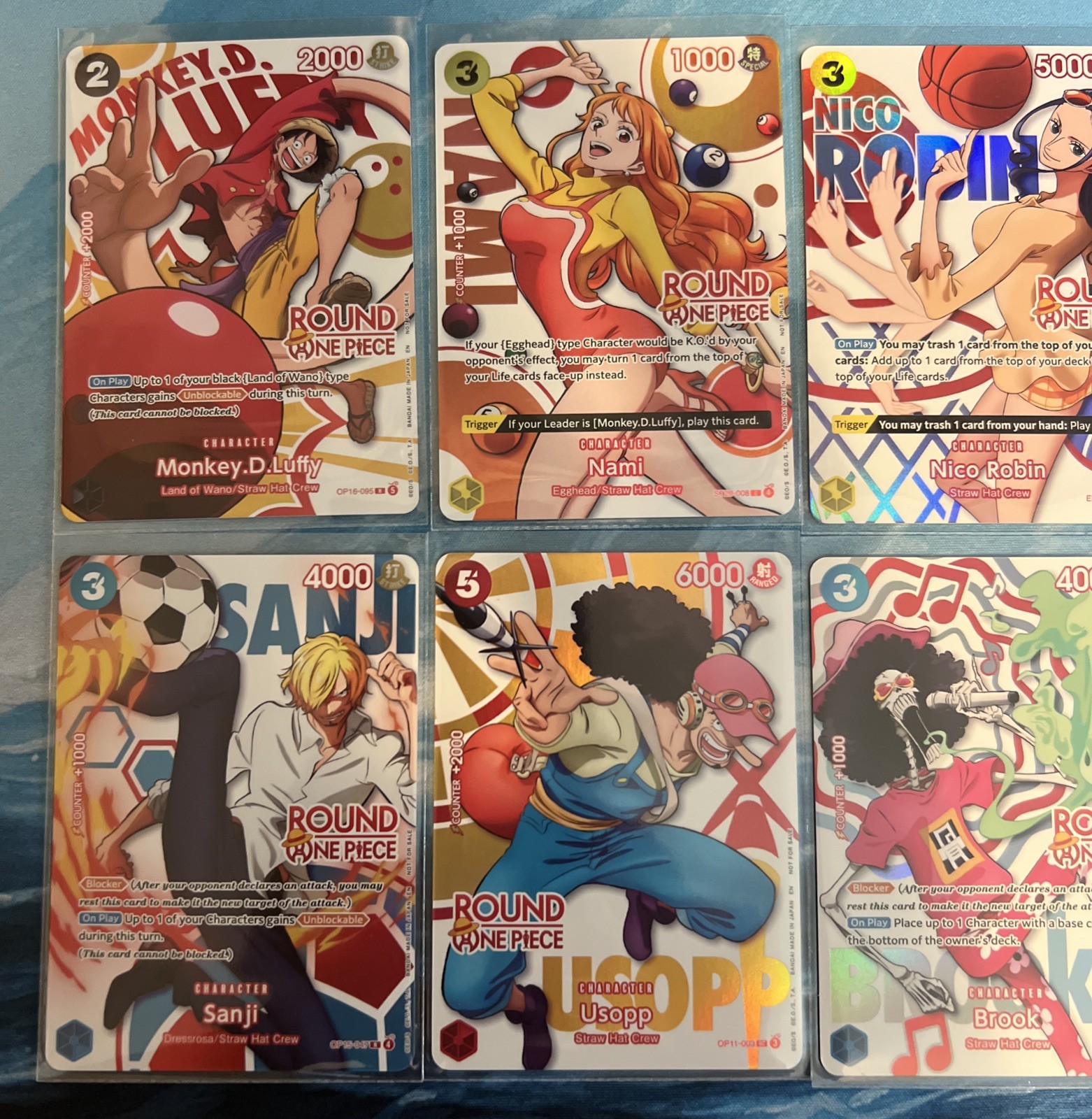 Round 1 x One Piece Promo Cards - Full Set of 10 English + 2 Keychains