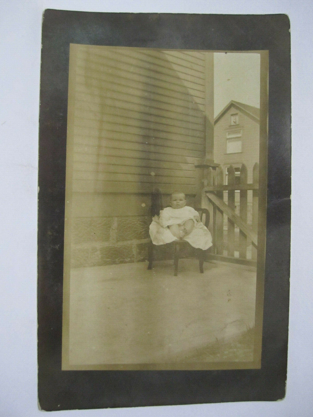 BABY SITTING IN CHAIR OUTSIDE PORTRAIT REAL PHOTO POSTCARD 1910 RPPC
