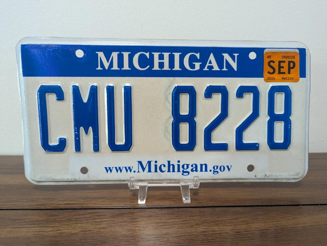 2015 Michigan License Plate #CMU 8228 