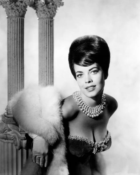 Susan Hart wearing a pearl necklace and an off-the-shoulder dress- Old Photo