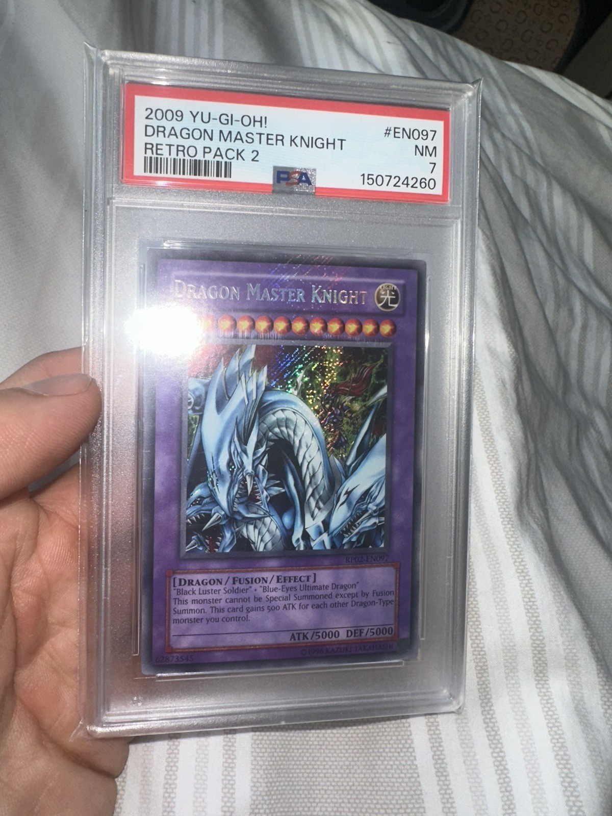 2009 YU-GI-OH Dragon Master Knight RP02-EN097 PSA 7