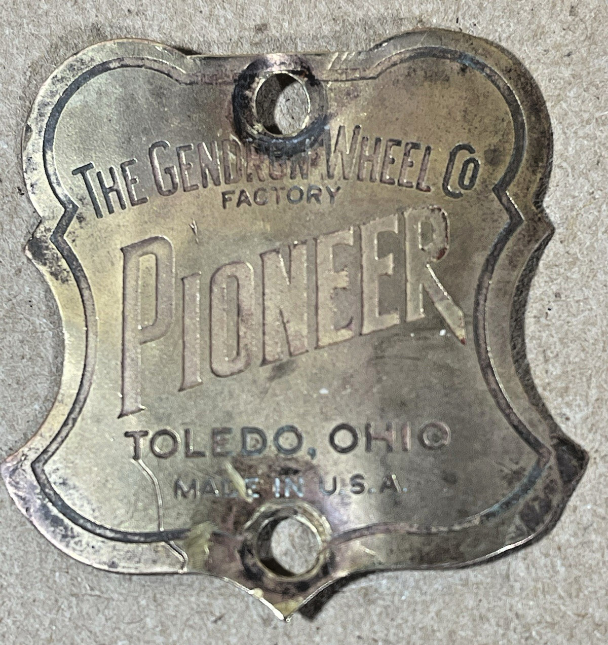 Vintage The Gendron Wheel Co. PIONEER Head Badge Tag Emblem Toledo, OH.