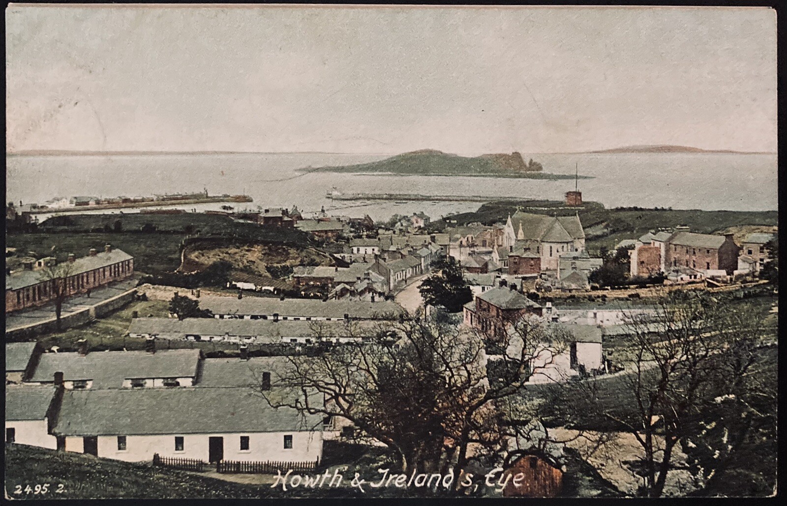 HOWTH, IRELAND. C.1910 PC.(A41)~VIEW OF HOWTH VILLAGE AND IRELAND’S EYE