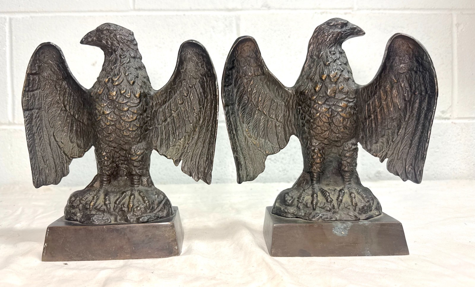 Pair of vintage solid bronze realistic open winged American bald eagle bookends