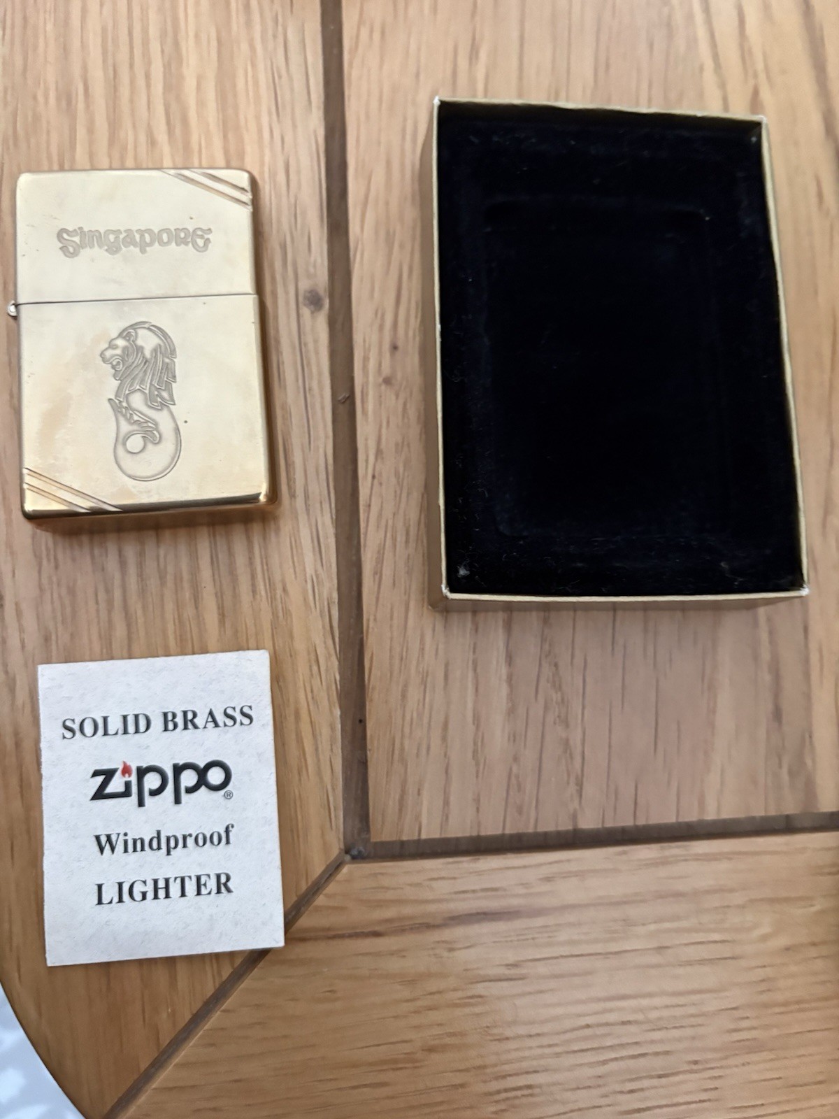 Brand New Zippo brass lighter with merlion Singapore logo - ultra rare