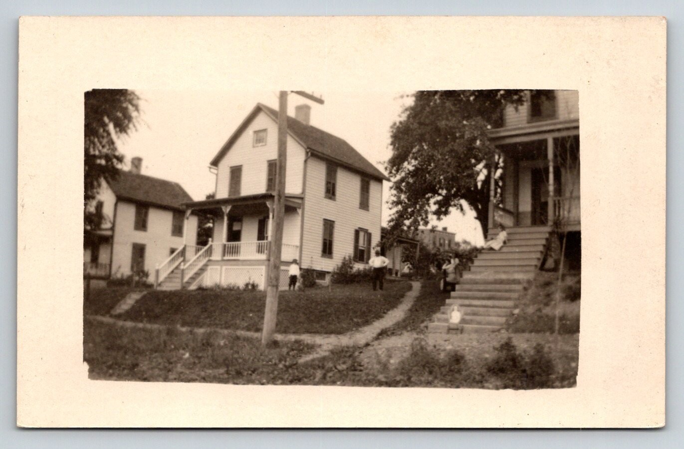 Vintage RPPC Real Photo Postcard Old Houses Street Scene People Family Early