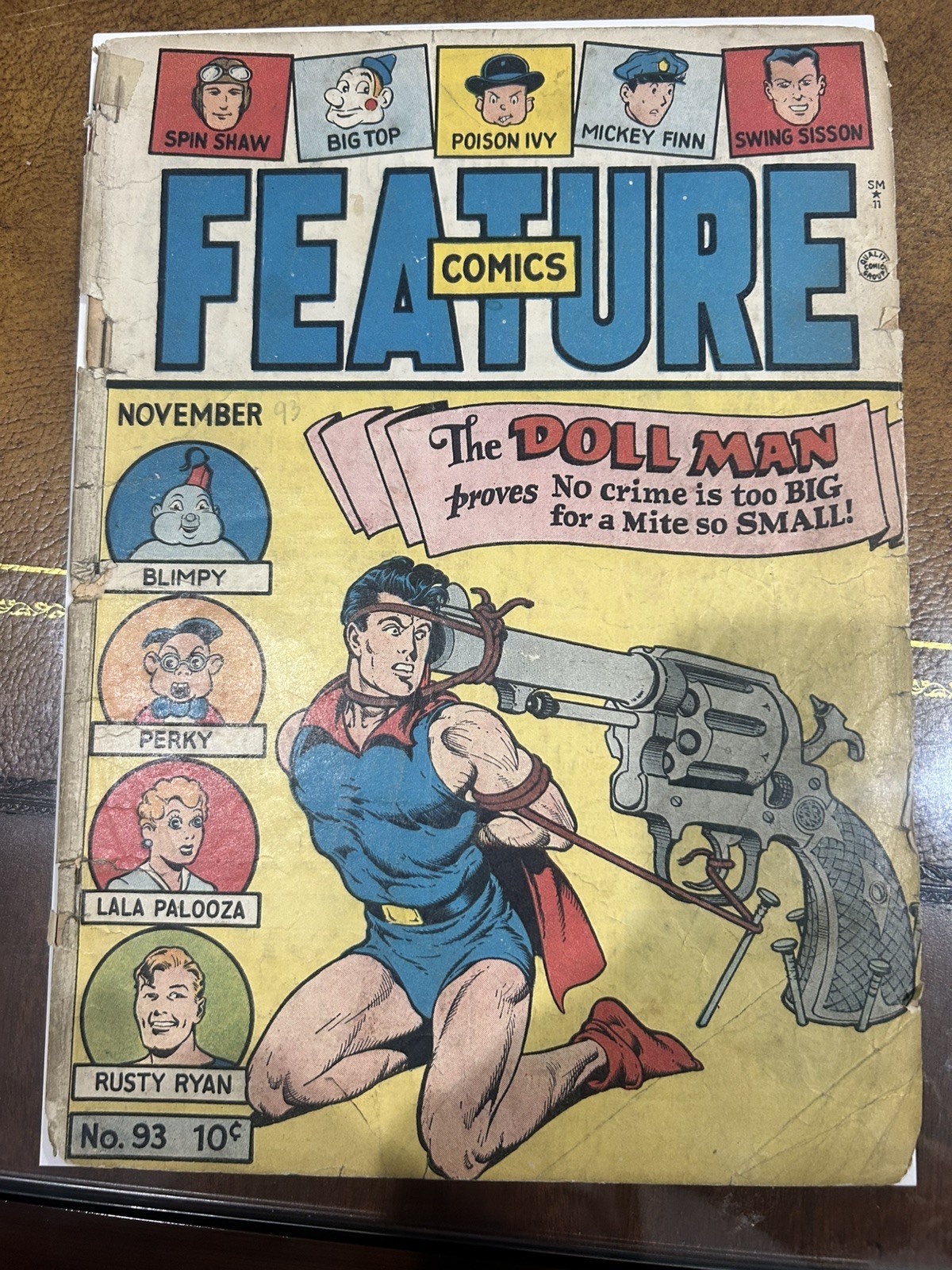 Feature Comics #93 1945 Doll Man Gun bondage cover  Pop 9 on CGC