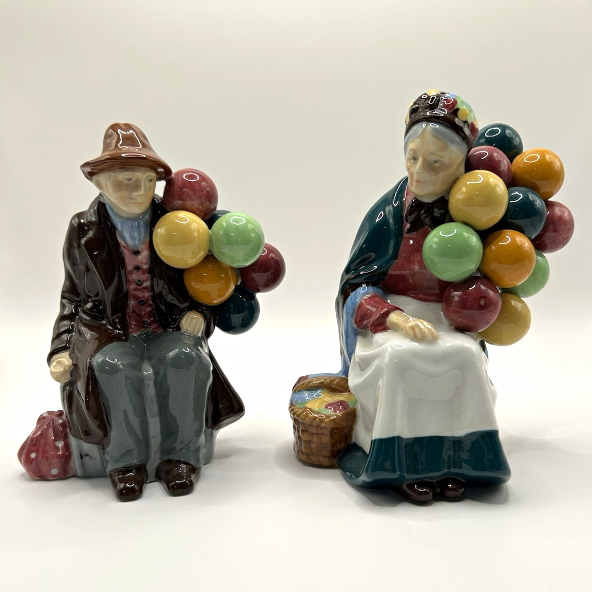 Balloon Seller Reproductions Ceramic Figurines Pair Hand Painted