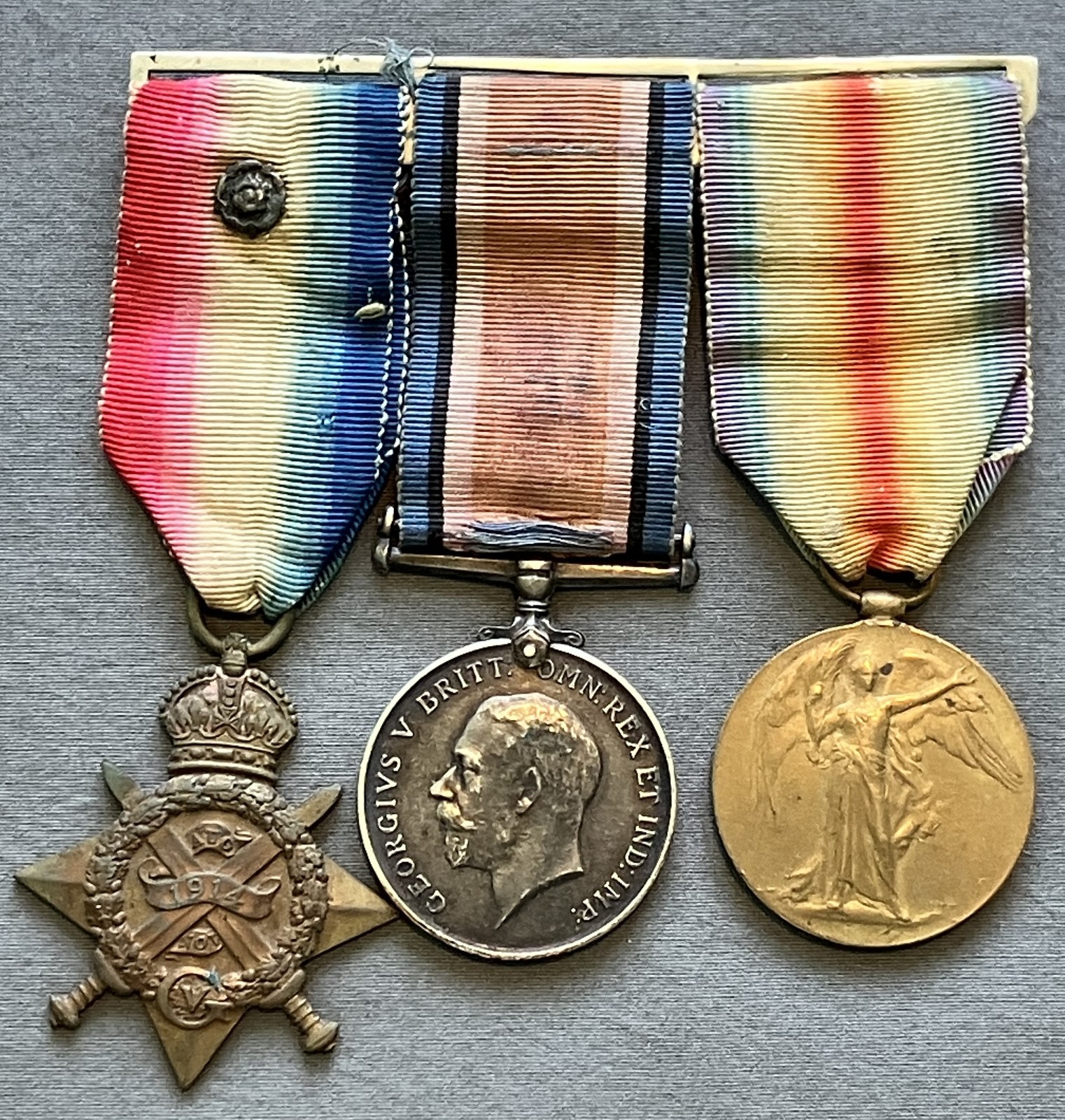 British 1914 Star trio w/Rosette 14434 DVR Thomas E King Royal Field Artillery