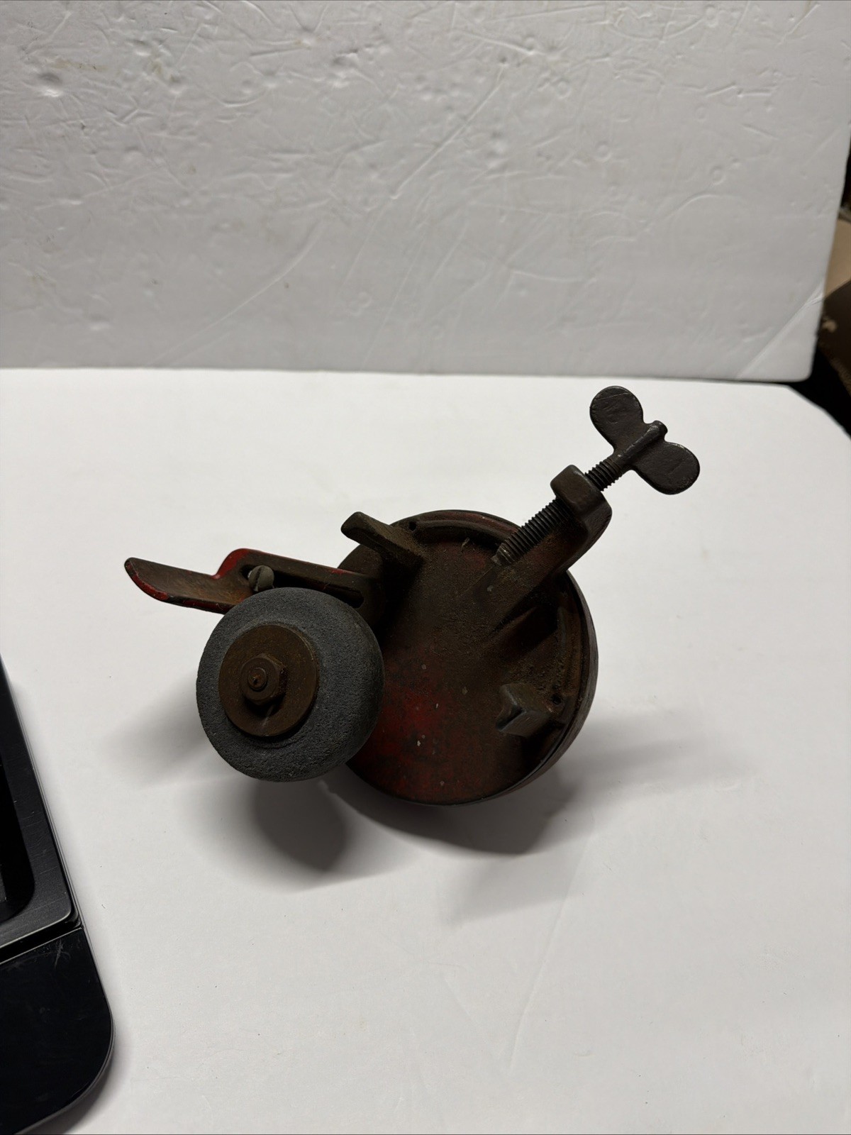 Antique hand crank bench grinder