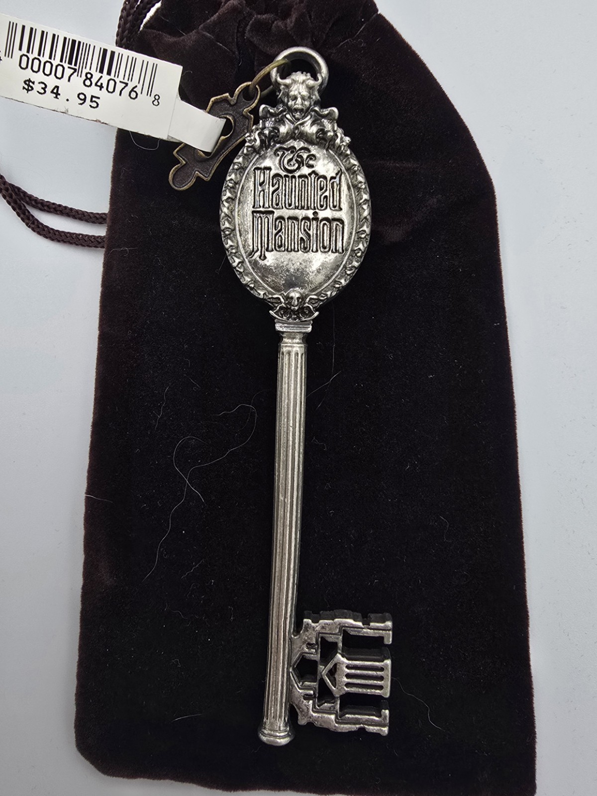 Disney Theme Parks Magic Kingdom Haunted Mansion Key BNWT original bag